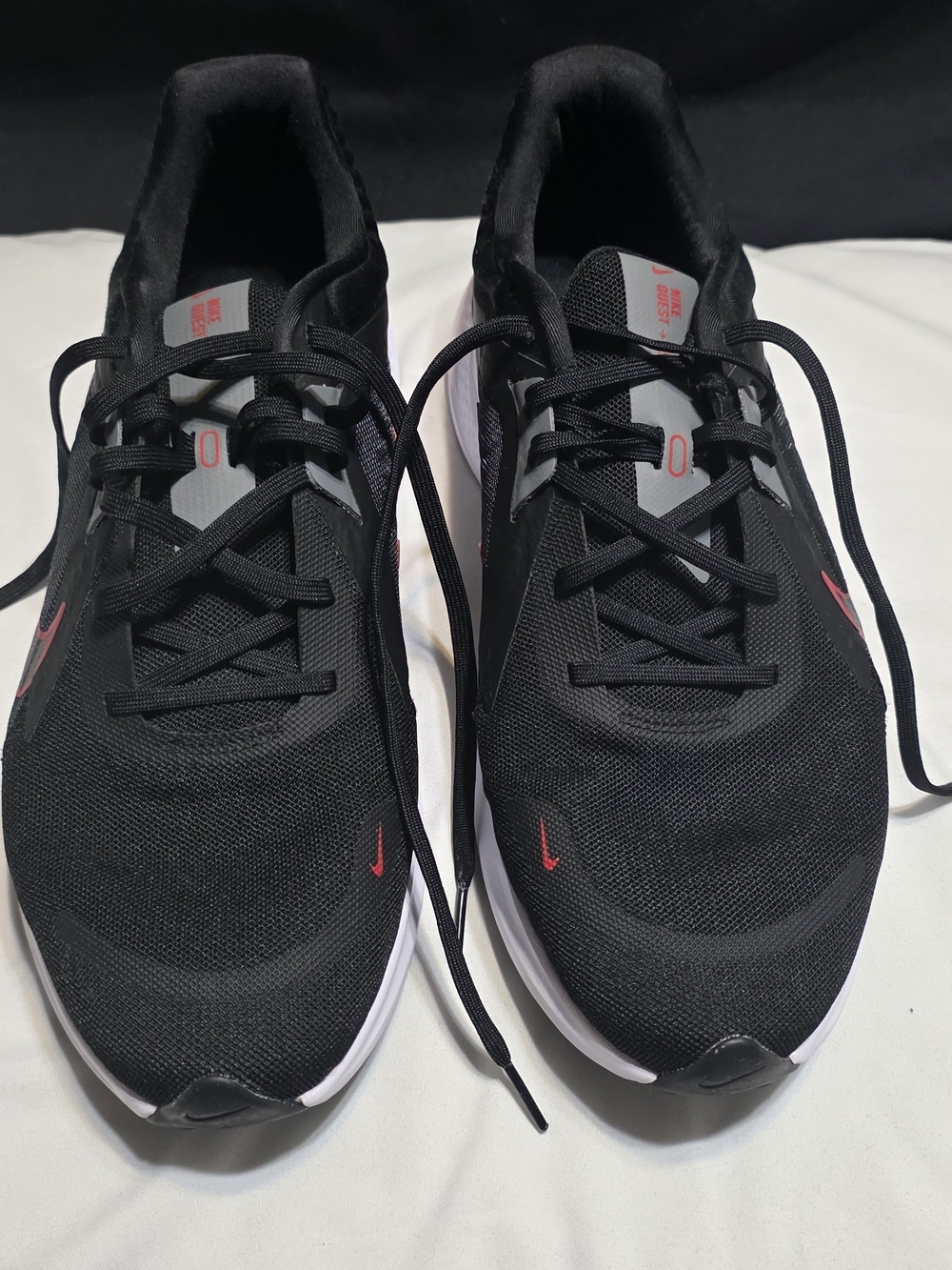 Nike Men’s Black Running Shoes with Red Accents